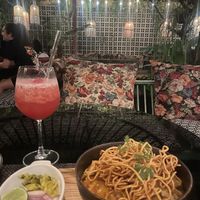 Khao soi and raspberry cocktail   at Downtown - Vegan Garden Restaurant in Chiang Mai