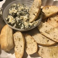 Spinach artichoke dip - INCREDIBLE! Crostini were *real* crunchy, beware of chipping a tooth   at The Chicago Diner - Lakeview in Chicago