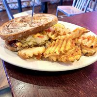 Reuben plate with waffle fries   at The Chicago Diner - Lakeview in Chicago