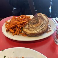 Reuben w/ Sweet Potato Fries (sorry you can't see the inside of the sandwich - it's delicious, just order it) at The Chicago Diner - Lakeview in Chicago