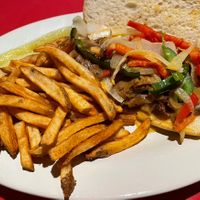 Philly cheesesteak with fries  at The Chicago Diner - Lakeview in Chicago