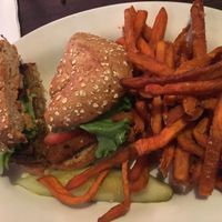 One half titanic BLT, one have spicy chicken burger + sweet potato fries!!  at The Chicago Diner - Lakeview in Chicago