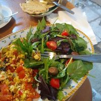 Tofu scramble with avocado, olives & salad 😍 at Bizou Cafe in Corfu