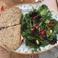 Hummus and tomato sandwich with the best salad 🥗  at Bizou Cafe in Corfu