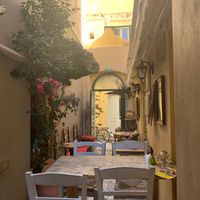 Clever use of the alleyway for a cozy seating area at Bizou Cafe in Corfu