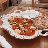 Greek Tofu Scramble with Olives, Tomato & Warm Pita 😋😋😋 at Bizou Cafe in Corfu