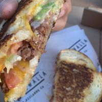 California Burger Grilled Cheese made with beyond meat and vegan cheeses at Cheesewalla in Redlands