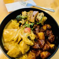 3 selections from their buffet: sweet and sour “chicken”, black pepper tofu, and tofu curry.. all yummy. (Soya chicken my favourite)  at Root Vegetarian in Cairns
