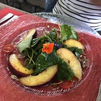 Salad with peach and nasturtium at Hotel Restaurant Löwen in Schopfheim