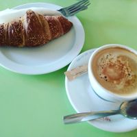 Vegan croissant with coffee and rice milk at La Libre in Madrid