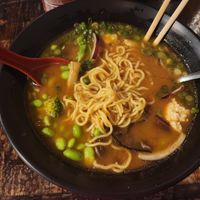 Build your own bowl with vegan miso broth, veggies, and noodles at Bols in Plano