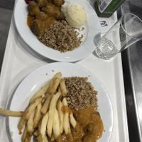 Veggie balls with Nordic grains, curry sauce, lingonberries, French fried, mashed potatoes  at IKEA in Tampa