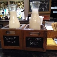 The almond milk always has the darker color. I think they were in the wrong place one day of our stay. at Bistro 72 in Riverhead