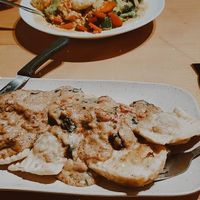 coconut curry & butternut squash ravioli w cashew alfredo sauce. a little heavy on the garlic but so so tasty! at Paliottis Westside in Maple Ridge