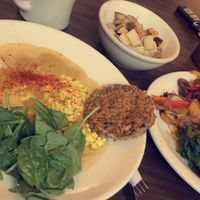 bowl with grits, tofu scramble, sausage, spinach, & sourdough toast  at Sluggo's North Vegetarian Cafe in Chattanooga