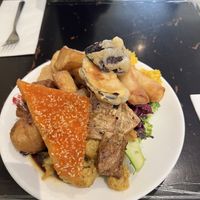 Plate of assorted vegan buffet food   at Su Vegan Buffet in West London