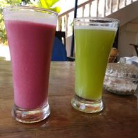 Beetroot, banana and coconut fruit juice (left) and grapes and lemon fruit juice (right) at Blue Planet in Agonda