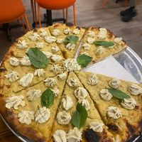 Punk Rock Girl - roasted garlic, olive oil, cashew ricotta and basil. at ROOST in York