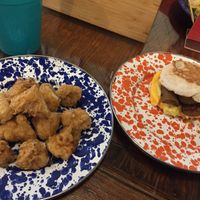 Fried cauliflower and a sausage, just egg and violife on an English muffin (all vegan)  at ROOST in York