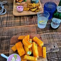 Polenta Fries with pink Mayo & Burger with Wedges and pink Mayo at Vegane Glorie in The Hague