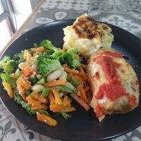 Meal of day June 2024... Cabbage wrap, potato casserole and veggies at Comer Sanar Vivir in Cuenca