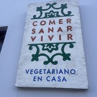 Restaurant sign  at Comer Sanar Vivir in Cuenca