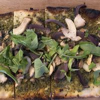 The Veganetah- sourdough flatbread with vegan macnut pesto, ali’i mushrooms and arugula at Ola Brew in Kailua Kona