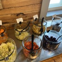 Salad buffet: Carrots with tarragon, citrus marinated cabbage, pickled swede, grilled olives, pickled mushrooms, lettuce, tomatoes, pickled beet, pea purée  at Härmän Rati in Jaervenpaeae