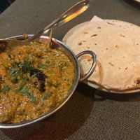 Eggplant and potato in spicy tomato sauce with chapati    at Chirag in Udaipur