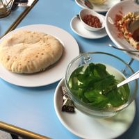 Bread, mint tea and spicy sauce  at YAFA in Stuttgart