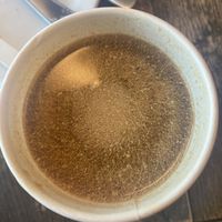Coffee with some curdled oat milk    at Seeds Cafe in Fornebu