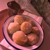 Vegan doughnuts and choc sauce   at Scream for Pizza in Newcastle Upon Tyne