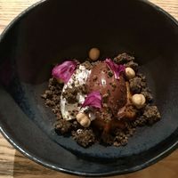 Dark Chocolate ganache, pumpkin cream and chicorée crumble at KLE in Zurich