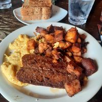 "The Alchemist": vegan eggs, vegan bacon, home fries, and two large pieces of multigrain toast at Toast Coffeehouse in Patchogue