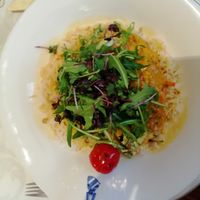 Thai lentil curry with vegetables, coco cream, rucola and rice at Reichsküchenmeister Restaurant in Rothenburg Ob Der Tauber