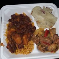 Yellow rice and beans, roasted "pork", and yuca at The Earthy Kitchen in Orlando