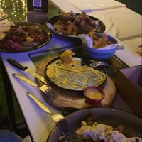 Vegan Lomo saltado, Peruvian Wantans, Salchipapas with vegan chicken and Rocoto relleno with cashew cheese and also fried yuca with dip  at Lounge del Brujo Vegan Kitchen & Bar Cayma in Arequipa