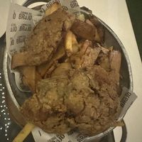 Poor picture of Salchipapa Broaster  at Lounge del Brujo Vegan Kitchen & Bar Cayma in Arequipa