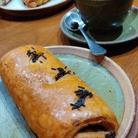 vegan pain au chocolat and coconut milk cappuccino at Coffee Ideas in Auroville