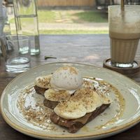 Vegan banana French toast and coco coffee  at Moochie's Cafe in Weligama