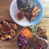 Veg burger, falafel bowl, and cauliflower popcorn! at Moochie's Cafe in Weligama