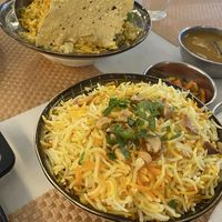 Saffron rice (~$3.60) and Hyderabad Mutton Briyani in the background   at Bazil Kitchen in Central Singapore