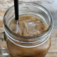 Iced latte with almond milk. at Santos Coffee With Soul in Oranjestad