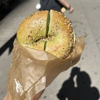 Vegan toasted jalapeno everything bagel with tofu spinach artichoke cream cheese at Liberty Bagels in New York City
