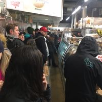 Inside shops, with long line at Liberty Bagels in New York City
