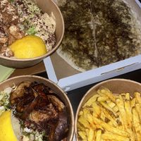Cauliflower bowl, eggplant bowl, zaataar flatbread , potato chips   at Santo Falafel in Florence