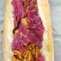 75 cent veggie dogs topped with Mustard, Pickles red cabbage and crispy fried onions at IKEA in Bolingbrook