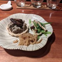 Mushroom paste on rice crackers, radish pickle, enoki and greens at Veganic Monkey Magic 浅草 in Tokyo