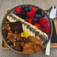 Beautiful Acai Bowl with added peanut butter and soy yogurt. at Kaffee Kamiel in Bruges