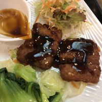 close up of the eel with the sauce poured on  at Loving Hut - Wan Chai in Hong Kong Island